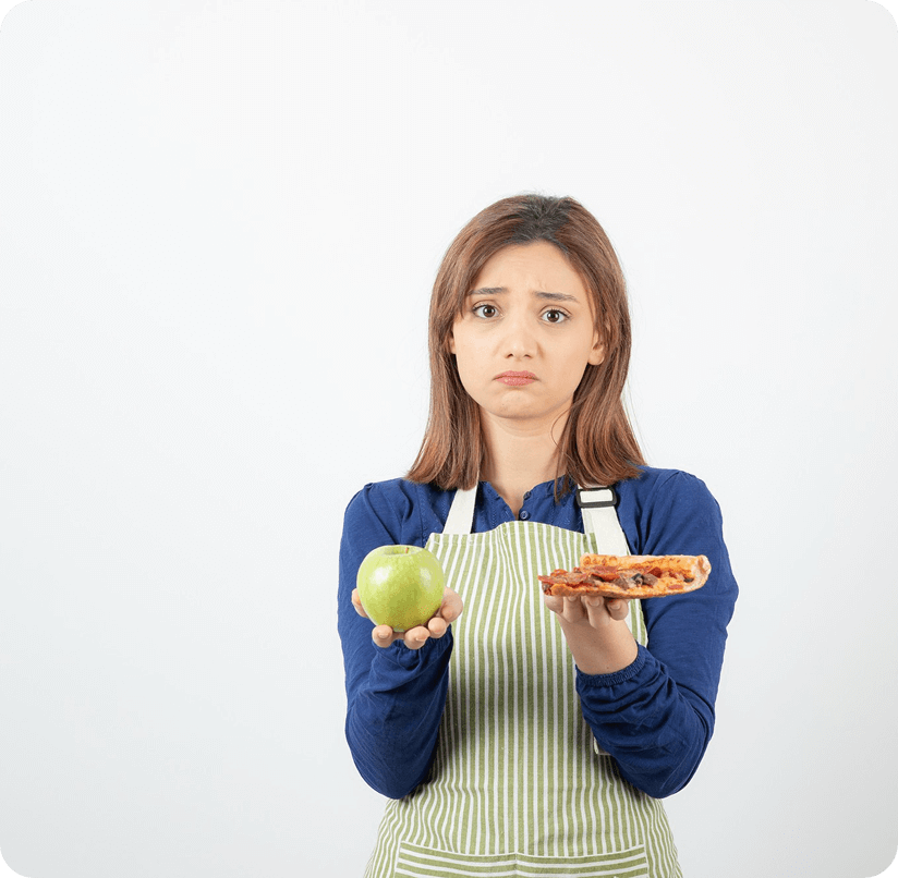 Confused woman holding pizza slice in one hand and an apple in the other, symbolizing the struggle of making healthy food choices.